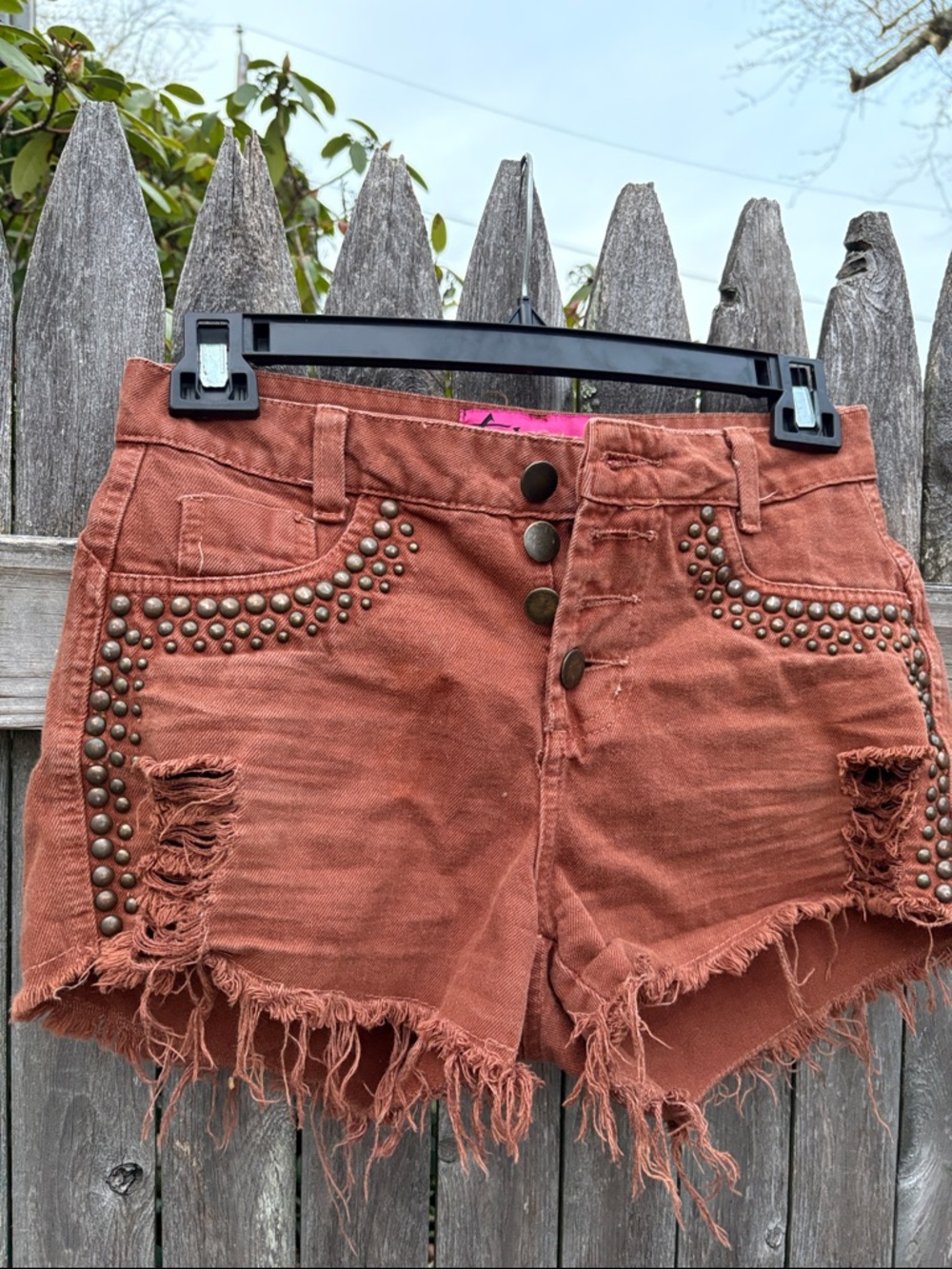 Luminosita size 40 cotton blend rust color shorts.